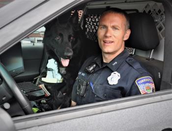 Officer Justin Deloy and Titus